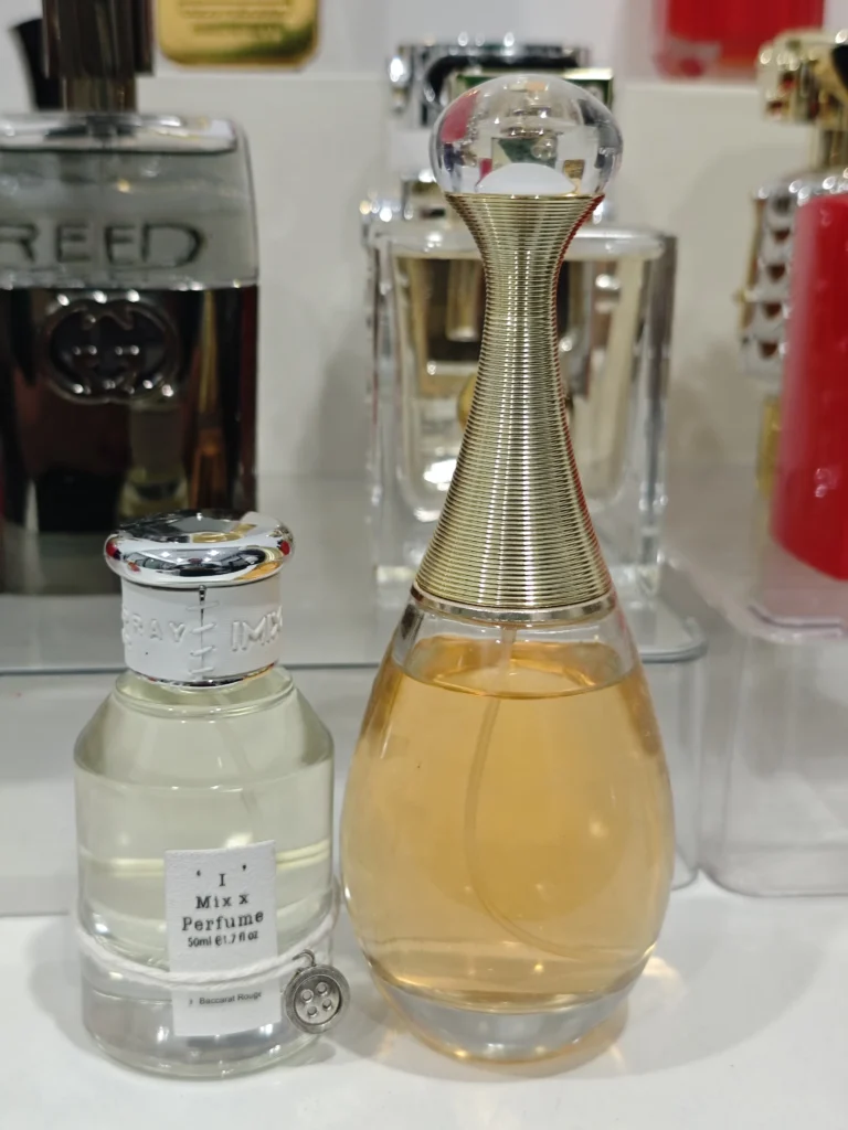 Side-by-side comparison of a traditional high-end luxury designer fragrance and a factory-direct affordable floral perfume alternative.