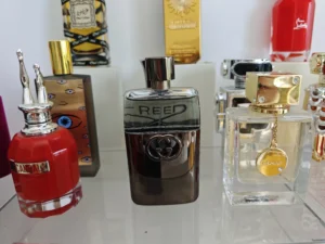 How to Find the Perfect La Fille de Berlin Dupes: A Supply Chain Expert's Guide 3 Cost structure comparison showing a traditional gothic rose glass bottle next to an affordable dark rose perfume without oud