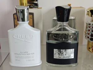How to Find the Best Creed Aventus Dupe in the USA (2026 Guide) 2 Side-by-side comparison of a luxury niche fragrance bottle and a premium direct-to-consumer Creed Aventus dupe.