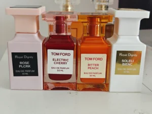 Side-by-side comparison of a $300 luxury designer cologne and a highly accurate, affordable Tobacco Vanille dupe.