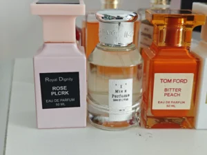 High-quality vanilla tobacco perfume alternative matched against an expensive luxury fragrance bottle.