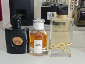 Concentration and ingredient cost comparison chart between a commercial Eau de Parfum and a high-performance coffee-vanilla fragrance extract.