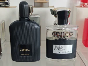 A side-by-side comparison of a $400 luxury niche fragrance and a high-quality affordable Aventus clone, highlighting the difference in retail markups.