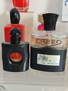 How to Find the Best YSL Black Opium Parfum Dupe (And Secret Hacks to Make It Last All Day) 3 Extrait de Parfum concentration test showing a budget-friendly Black Opium dupe by Imixx next to traditional luxury designer fragrance packaging.
