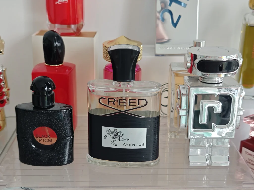 How to Find the Ultimate Bloom Dupe in the USA: A Master Perfumer's Guide 5 Side-by-side cost and packaging comparison of an expensive designer white floral perfume and a high-quality affordable bloom dupe.