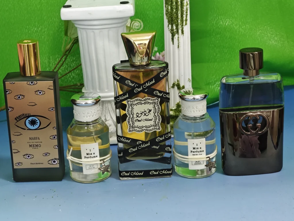 How to Spot High-Quality Fragrance Dupes in the USA: The Ultimate Supply Chain Expert's Guide 3 A side-by-side comparison of an expensive luxury designer perfume and a high-quality fragrance dupe in a minimalist bottle.