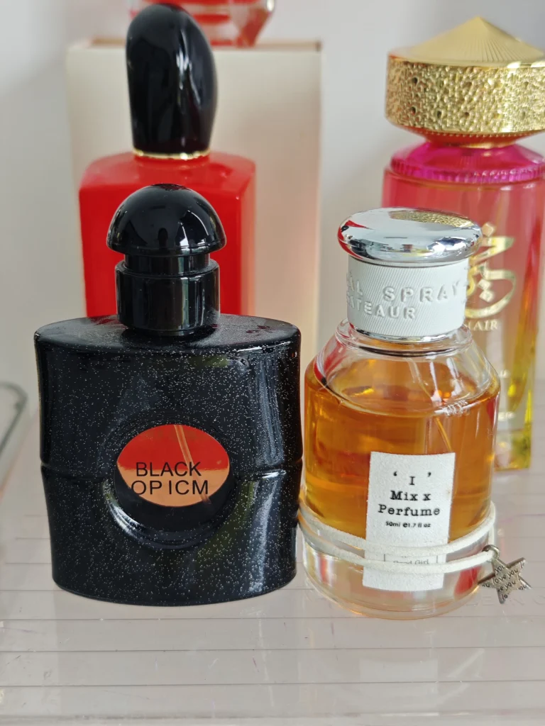 Side-by-side comparison of a YSL Black Opium designer perfume bottle and a high-quality affordable alternative showcasing the coffee vanilla fragrance notes.