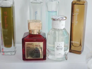 How to Find the Best Baccarat Rouge 540 Dupes in the USA: A Master Perfumer’s Guide 3 Cost and ingredient breakdown comparing a traditional luxury fragrance bottle with an affordable, long-lasting amberwood saffron perfume alternative