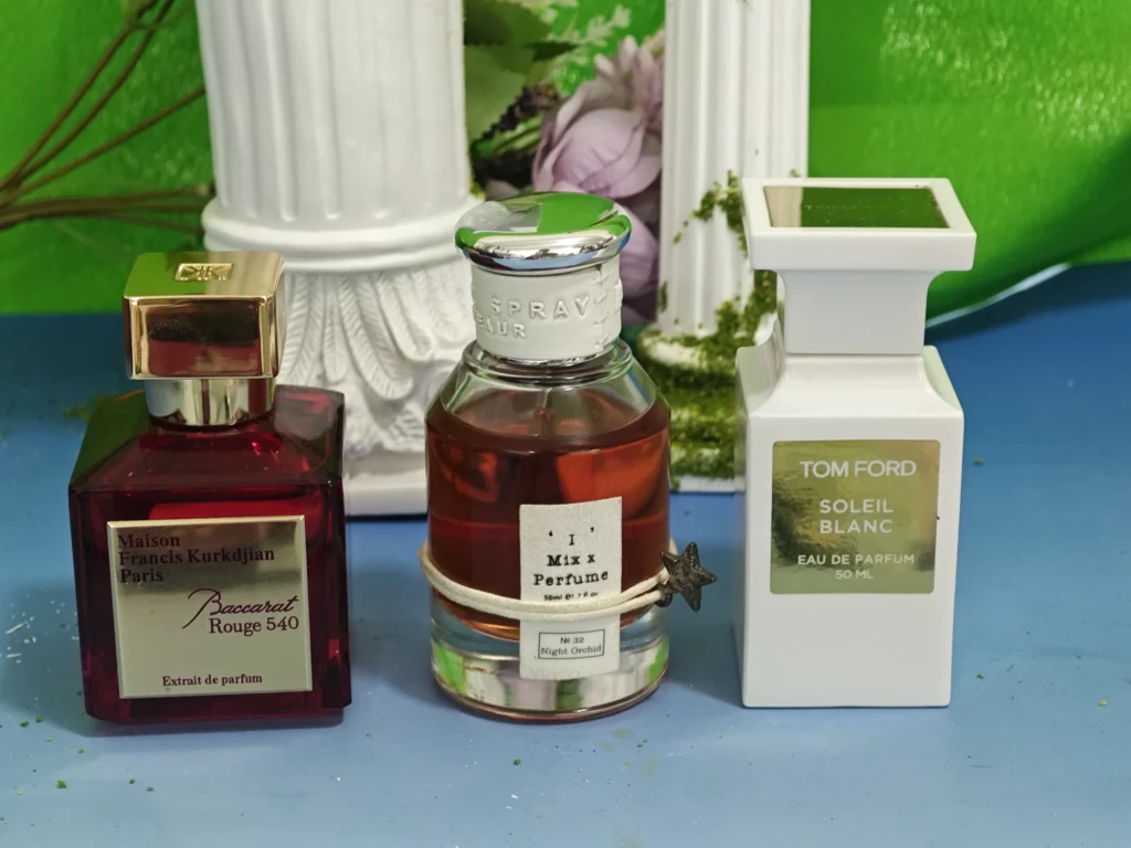 Side by side comparison of a $300 luxury designer perfume bottle and a high-quality, long-lasting fragrance clone alternative.