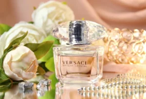 How to Find the Best Versace Bright Crystal Dupe: An Industry Insider’s Guide 3 Comparing the packaging and EDP concentration of a long-lasting Versace Bright Crystal alternative next to the original pink designer bottle.