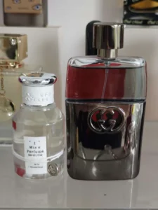 How to Find the Best Gucci Guilty Perfume Dupe in the USA: A Lab-Tested Guide to Notes, Longevity, and Supply Chain Transparency 3 Luxury designer perfume bottle next to an affordable high-quality alternative, highlighting the difference in packaging markups.