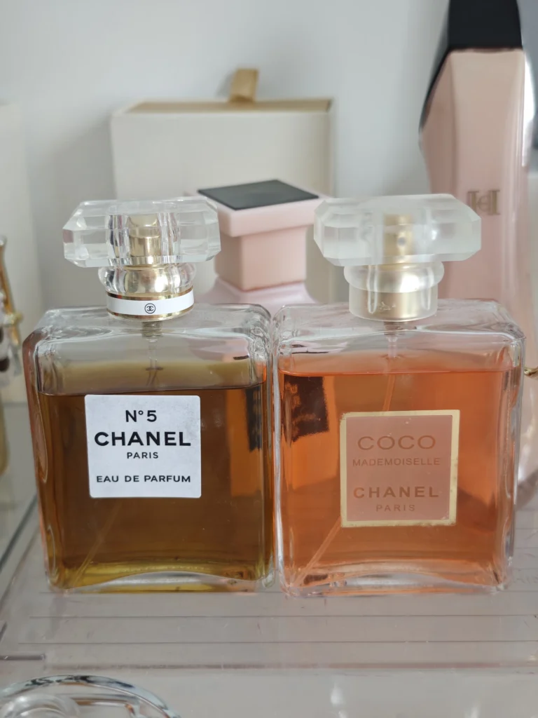 Side-by-side comparison of a $160 designer chypre floral perfume and a high-quality Coco Mademoiselle dupe bottle.