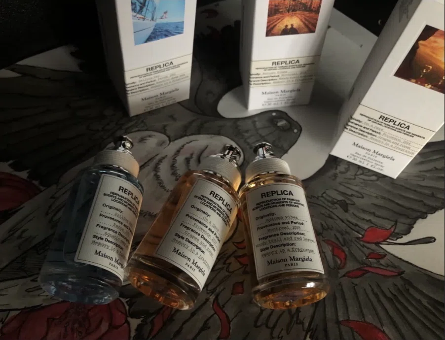 Side-by-side comparison of a luxury Maison Margiela fragrance bottle and an affordable, long-lasting EDP fragrance dupe.