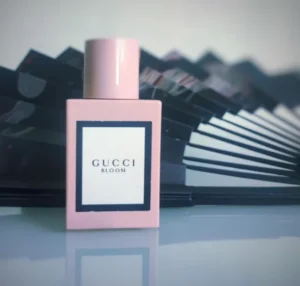 Gucci Bloom style fragrance comparison showing designer perfume and affordable white floral alternative