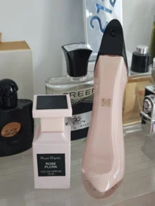 How to Find and Layer the Perfect Carolina Herrera Good Girl Dupe in the USA 2 Side-by-side comparison of the Carolina Herrera Good Girl stiletto bottle and a high-quality affordable dupe alternative in the USA.