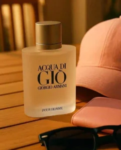 Side-by-side comparison of an expensive luxury designer aquatic perfume and a high-quality affordable Acqua di Gioia dupe.