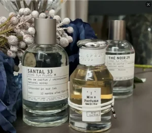How to Smell Like Le Labo dupe for Less: The Ultimate Supply Chain & Skin-Chemistry Guide to Finding Your Perfect Dupe in the USA (2026) 2 A side-by-side cost and packaging comparison of a $300 traditional luxury perfume and an affordable direct-to-consumer fragrance alternative in the USA.
